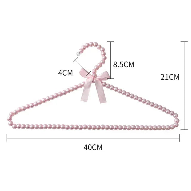 Cintre en perle rose