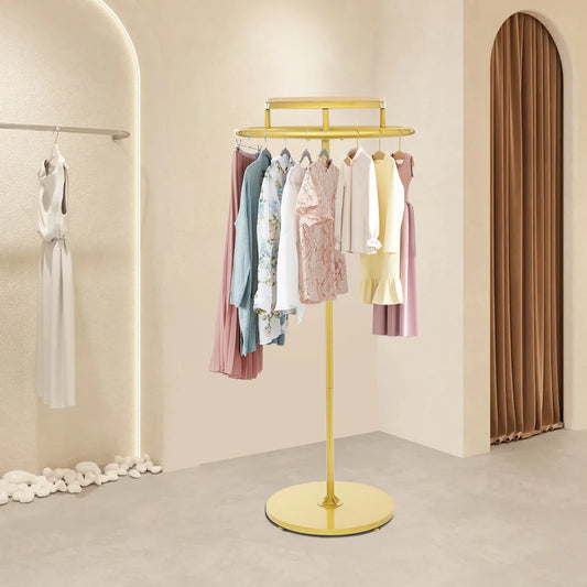 Présentoir vêtement magasin doré